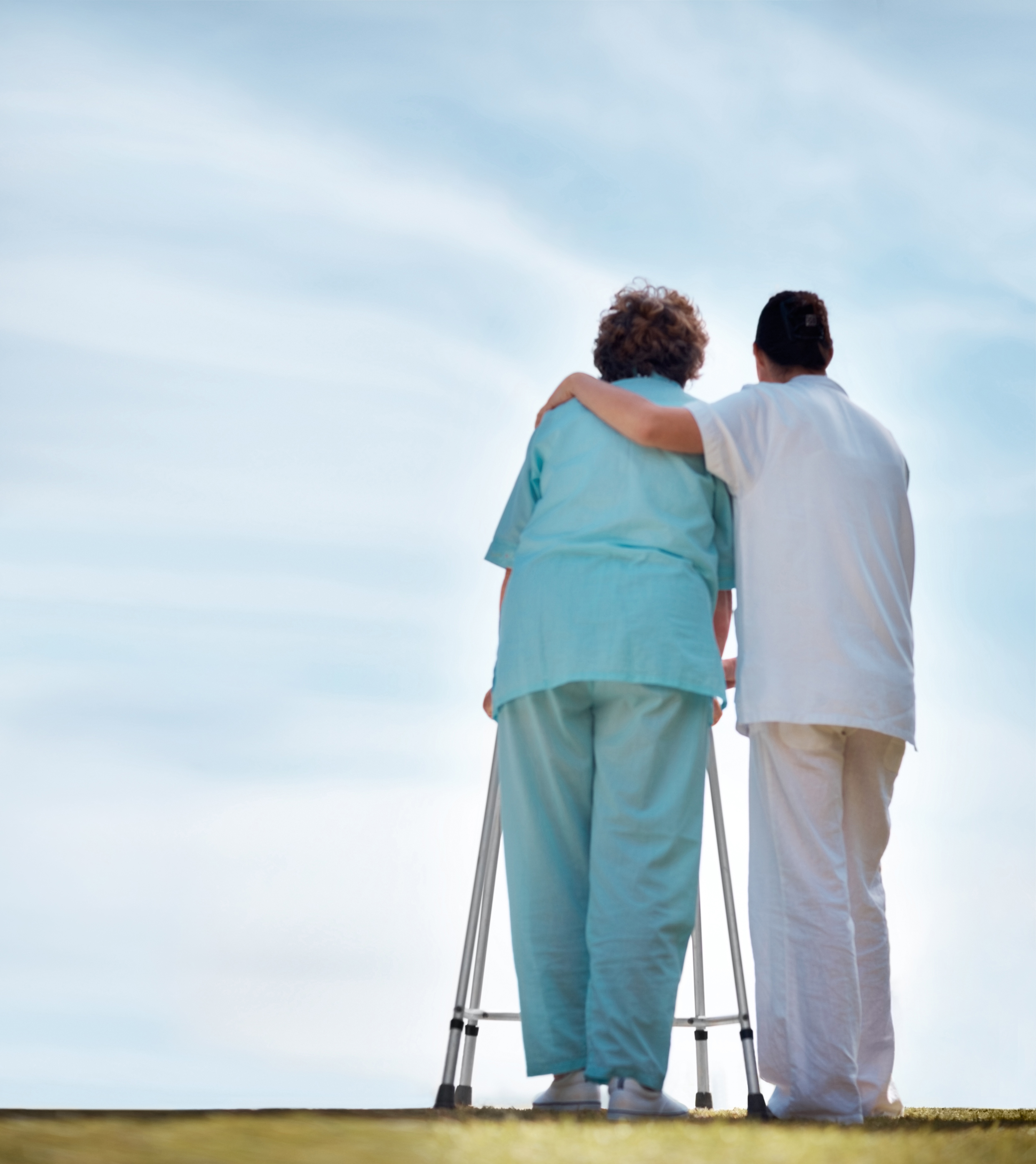 Caregiver with woman in blue